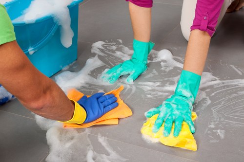 Safety-focused property care team using protective equipment and planned procedures