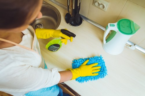 Spot cleaning a mattress stain with a cloth